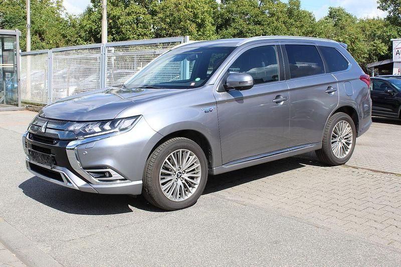 Grau Gebraucht 2019 Mitsubishi Outlander P-HEV Top SUV | 19.990 € (Fairer Preis) - Bild 1/4