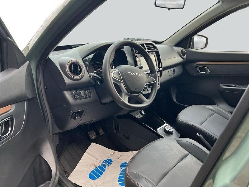 Gebraucht Dacia Spring Extreme 47 kW (65 PS) 2023 Grün "flechtengrau" Kleinwagen