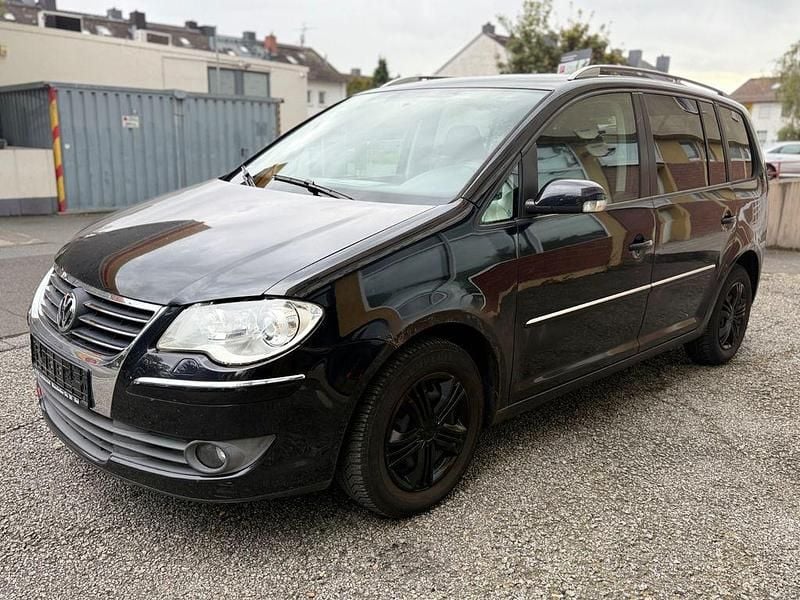 Schwarz Gebraucht 2009 VW Touran Highline Van / Kleinbus | 1.990 € (Superpreis) - Bild 1/4