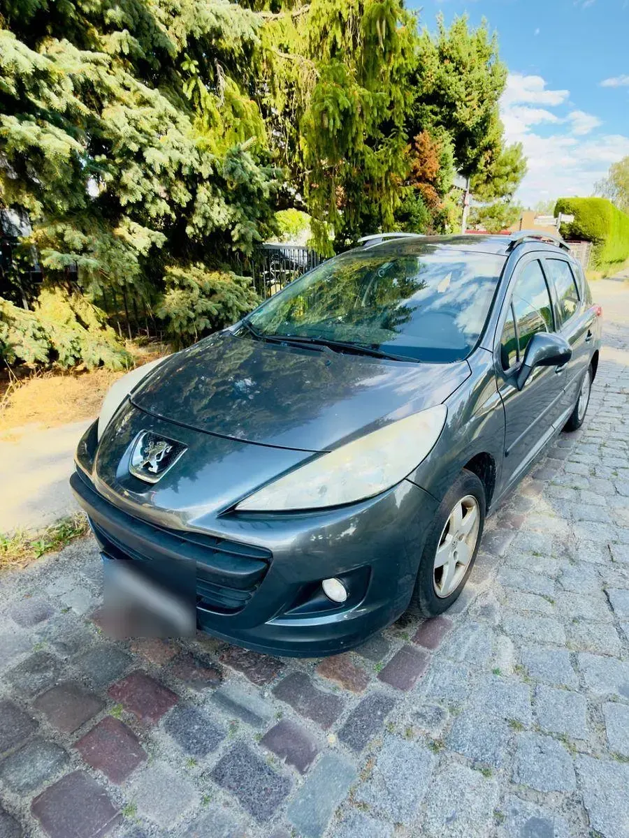 Gebraucht Peugeot 207 95 PS (69 kW) 2010 Grau Kombi