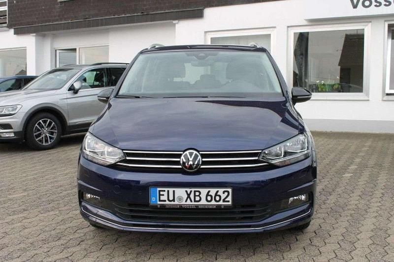 Atlantik blau metallic Gebraucht 2024 VW Touran Goal Van / Kleinbus | 36.970 € - Bild 1/4