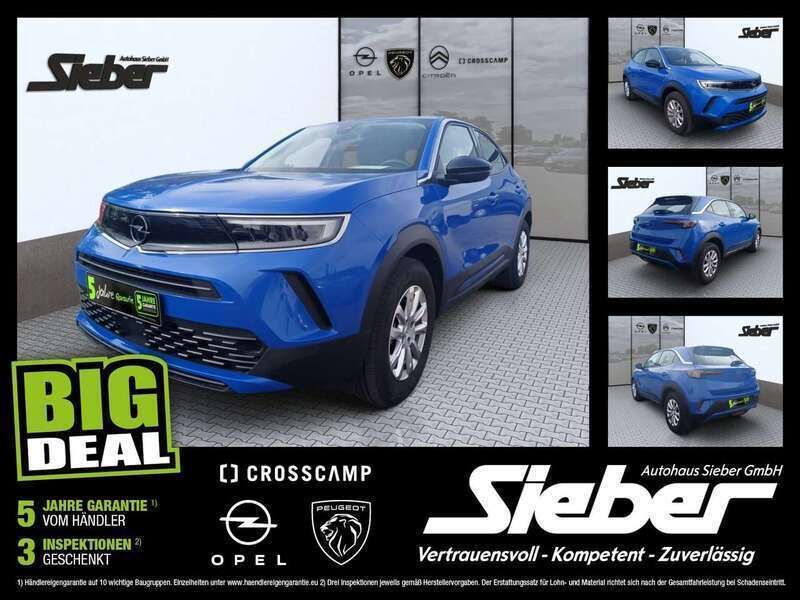 Perl blau/voltaik blau Gebraucht 2022 Opel Mokka-e Edition SUV | 14.990 € (Superpreis) - Bild 1/4