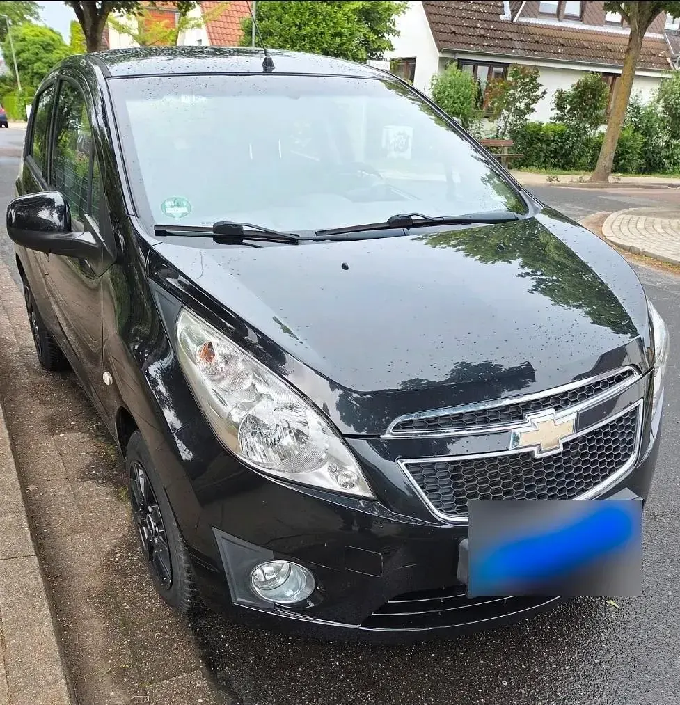 Gebraucht Chevrolet Spark 64 PS (47 kW) 2012 Schwarz Kleinwagen