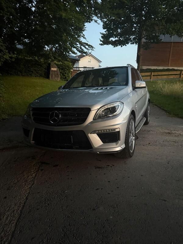 Silber Gebraucht 2012 Mercedes ML63 AMG AMG SUV | 25.900 € (Guter Preis) - Bild 1/4