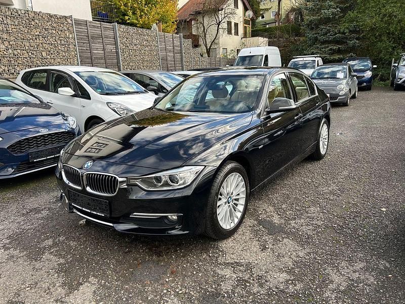 Schwarz Gebraucht 2012 BMW 320 Comfort Edition Limousine | 12.990 € (Fairer Preis) - Bild 1/4