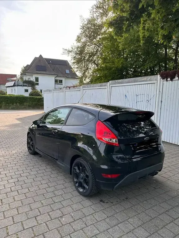 Używany Ford Fiesta S 135 KM (99 kW) 2012 Czarny Sedan/Limuzyna