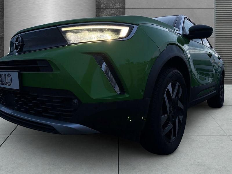 Gebraucht Opel Mokka-e Elegance 100 kW (136 PS) 2023 Matcha green/ikone gruen SUV