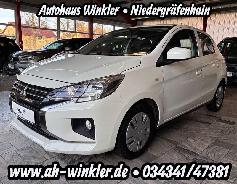 Weiß Gebraucht 2022 Mitsubishi Space Star Select Kleinwagen | 10.989 € (Fairer Preis) - Bild 1/4