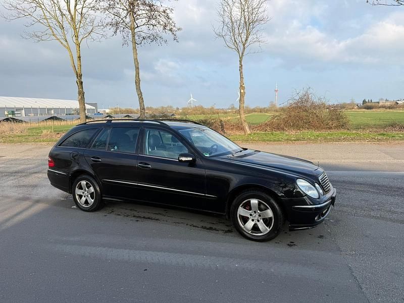 Second-hand Mercedes E320 204 CP (150 kW) 2004 Negru Break