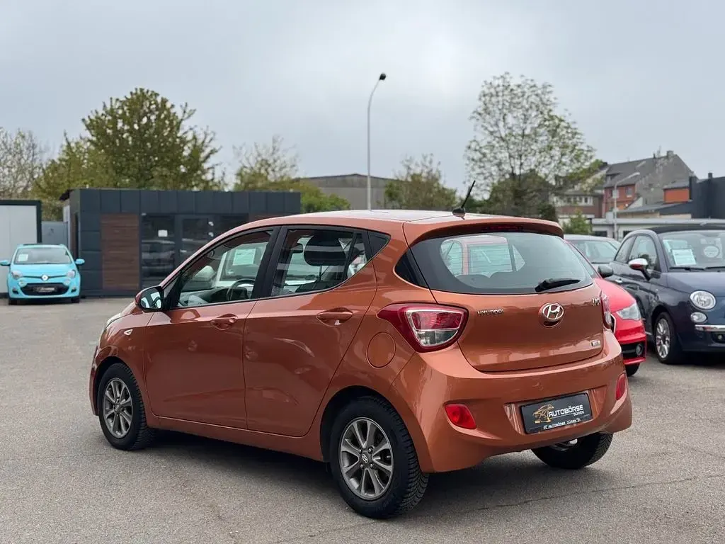 Gebraucht Hyundai i10 Intro Edition 87 PS (63 kW) 2014 Orange Kleinwagen