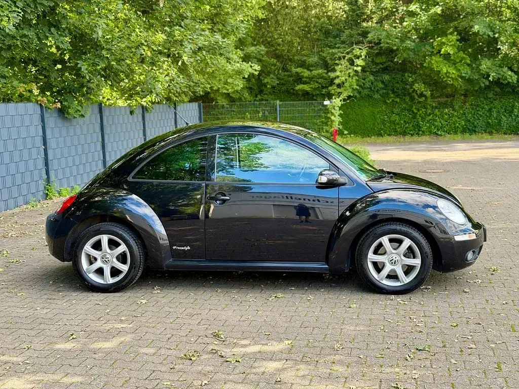 Gebraucht VW New Beetle 102 PS (75 kW) 2009 Schwarz Kleinwagen