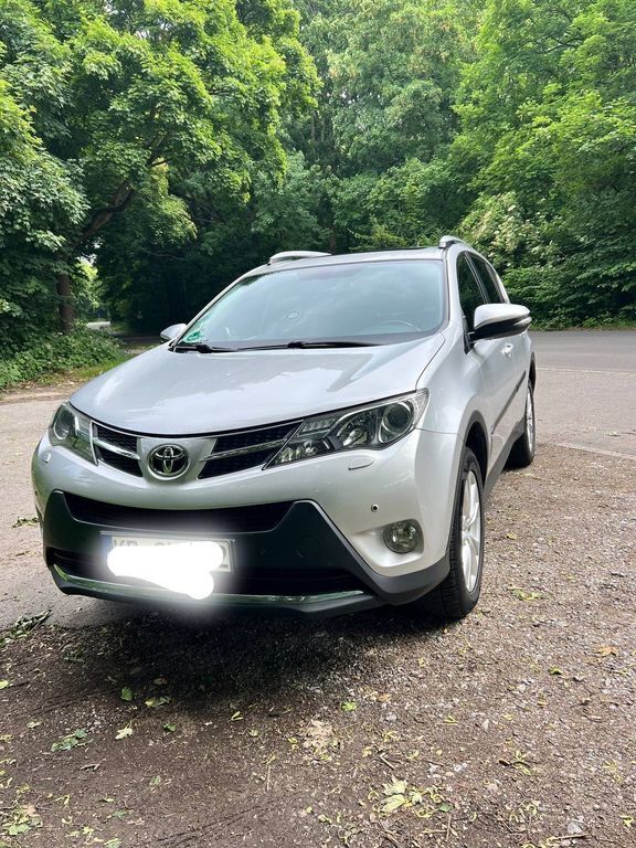Grau Gebraucht 2013 Toyota RAV4 Executive SUV | 9.900 € (Superpreis) - Bild 1/4