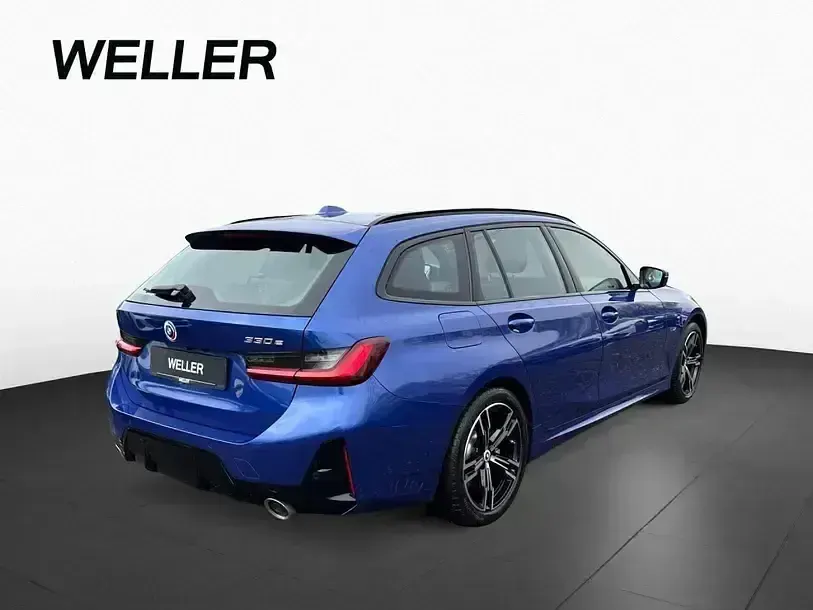 Gebraucht BMW 330e Performance 292 PS (214 kW) 2022 Blau Kombi