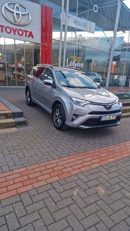 Grau Gebraucht 2016 Toyota RAV4 Hybrid Executive SUV | 21.200 € (Fairer Preis) - Bild 1/4