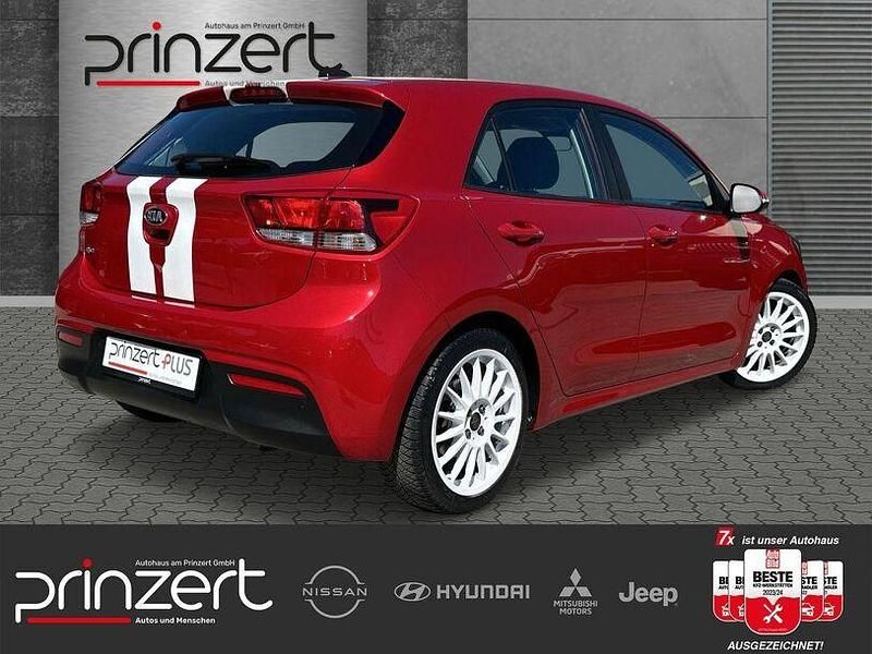 Gebraucht Kia Rio Vision 101 PS (74 kW) 2021 (beg) signalrot met. Limousine