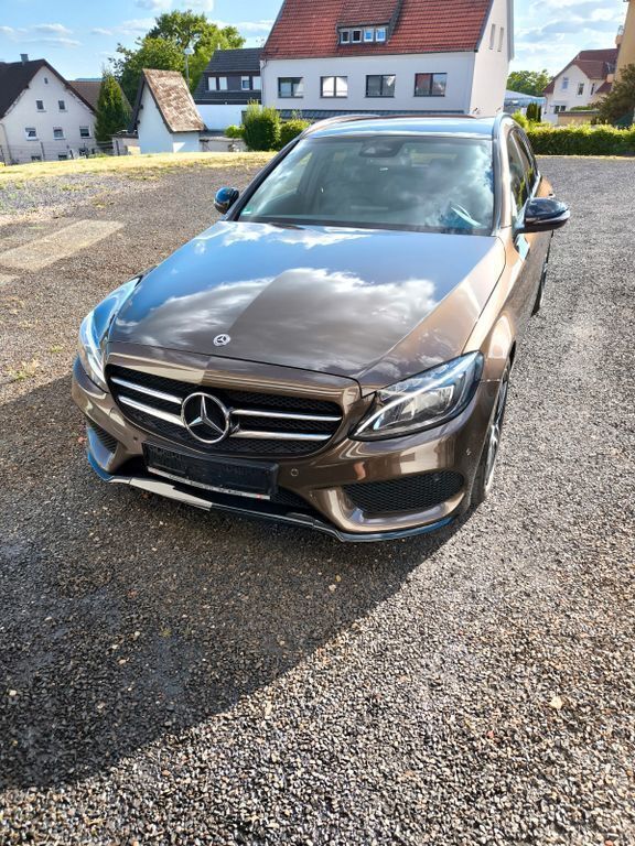 Braun Gebraucht 2017 Mercedes C250 AMG line Limousine | 19.900 € (Superpreis) - Bild 1/4
