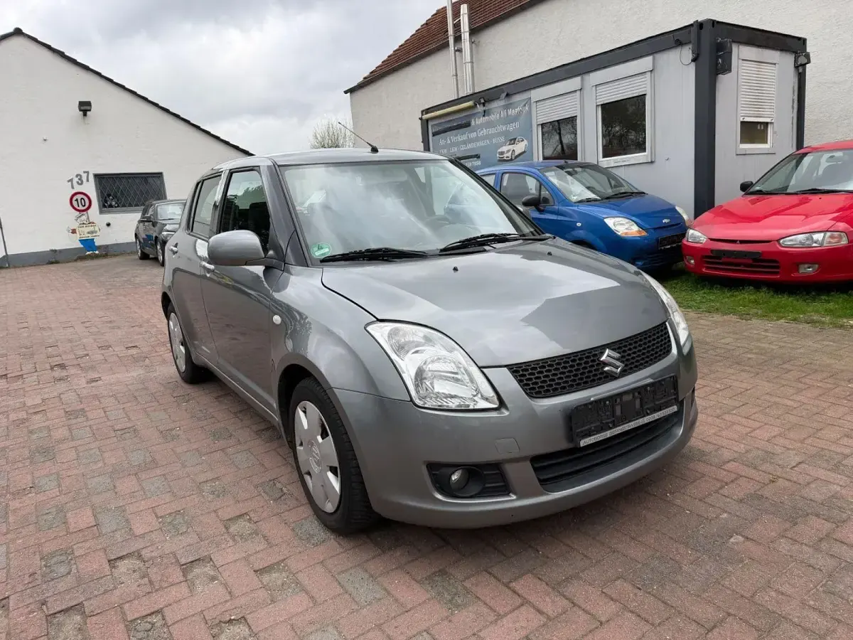 Używany Suzuki Swift Snow 92 KM (67 kW) 2007 Szary Hatchback