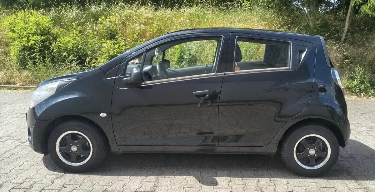 Gebraucht Chevrolet Spark 68 PS (50 kW) 2012 Schwarz Kleinwagen