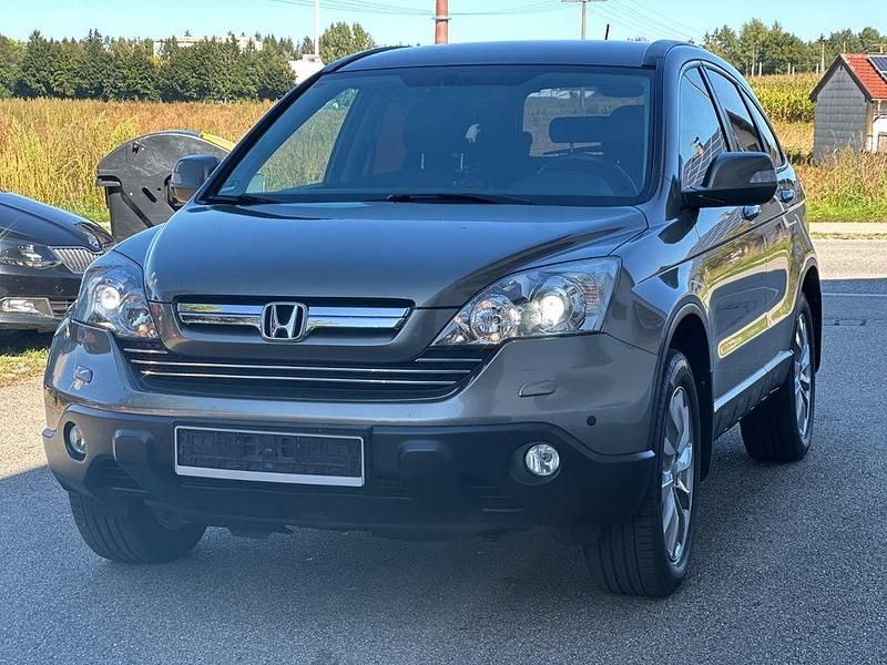 Grau Gebraucht 2009 Honda CR-V Exclusive SUV | 8.990 € (Fairer Preis) - Bild 1/4