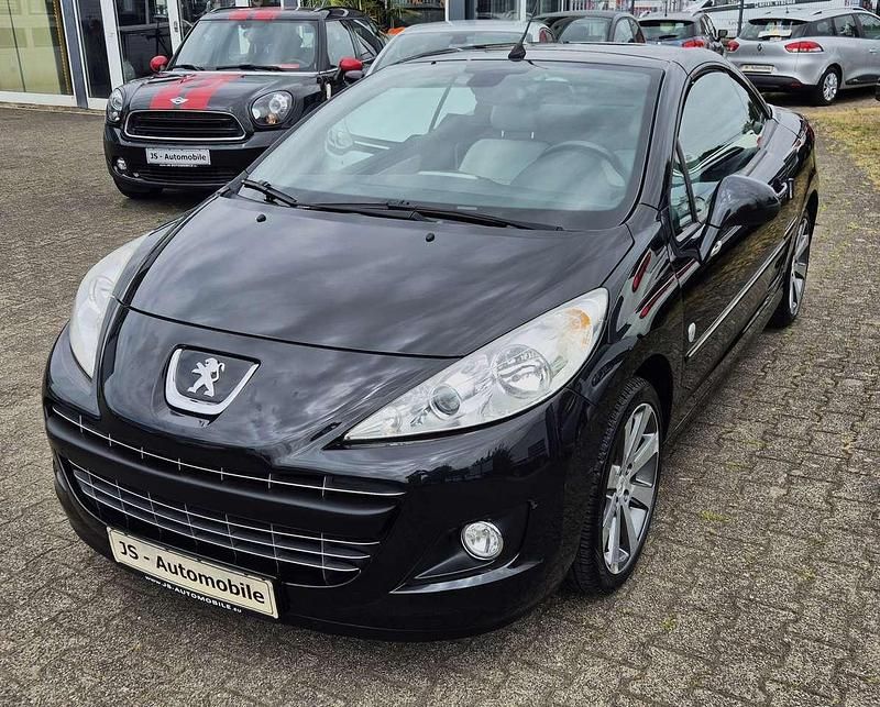 Schwarz Gebraucht 2012 Peugeot 207 Roland Garros Cabrio | 7.900 € (Teuer) - Bild 1/4