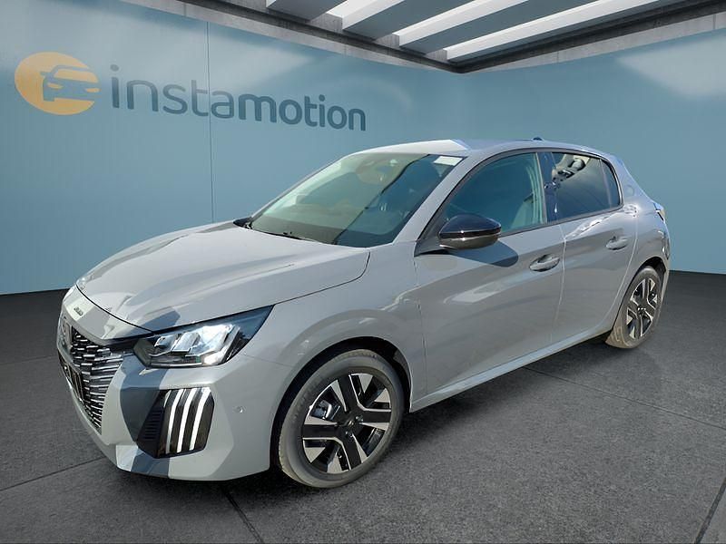 Grau Neu 2025 Peugeot e-208 Allure Kleinwagen | 32.799 € (Teuer) - Bild 1/4