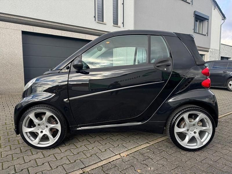 Schwarz Gebraucht 2010 Smart ForTwo Cabrio Brabus Cabrio | 5.999 € (Fairer Preis) - Bild 1/4