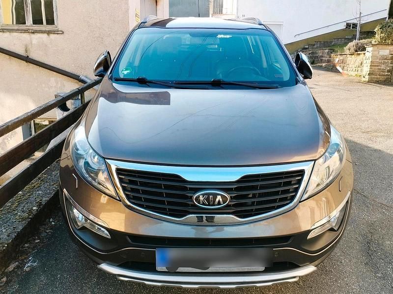 Braun Gebraucht 2012 Kia Sportage SUV | 6.500 € - Bild 1/4