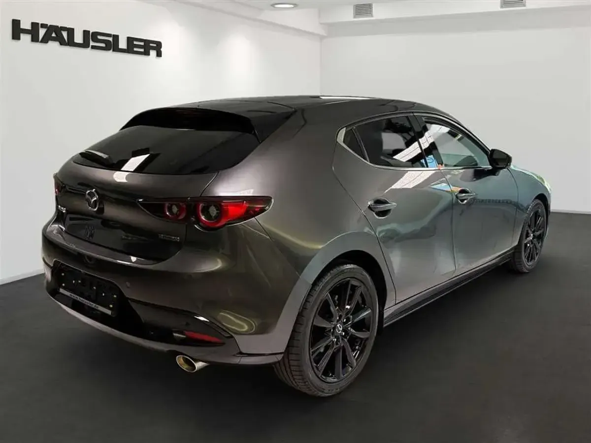 Gebraucht Mazda 3 Homura-Line 186 PS (136 kW) 2024 Machine grey Kleinwagen