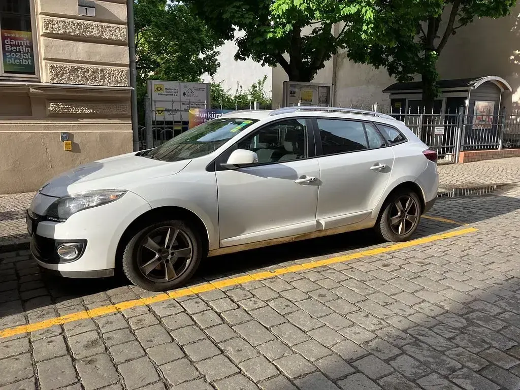 Używany Renault Mégane Initiale Paris 101 KM (74 kW) 2013 Biały Sedan/Limuzyna