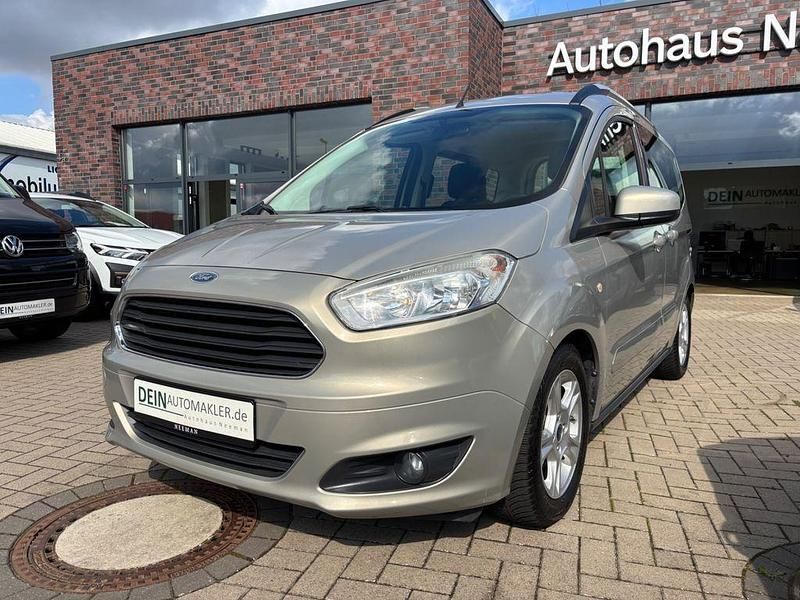 Silber Gebraucht 2014 Ford Tourneo Courier Van / Kleinbus | 8.980 € (Teuer) - Bild 1/4