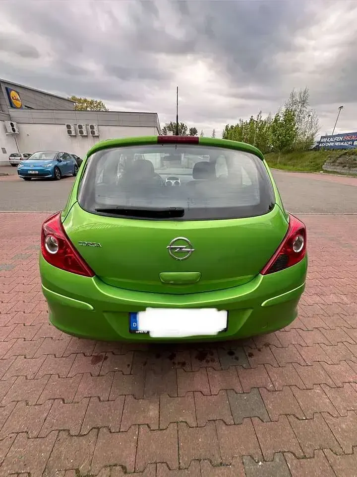 Gebraucht Opel Corsa Edition 69 PS (50 kW) 2014 Grün Kleinwagen
