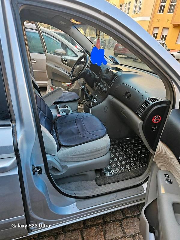 Second-hand Kia Carnival 2010 Argintiu Monovolum