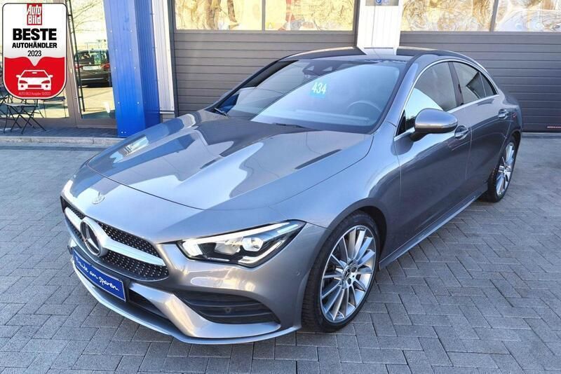 Grau (mountaingraumet.) Gebraucht 2020 Mercedes CLA200 AMG line Limousine | 27.950 € (Guter Preis) - Bild 1/4