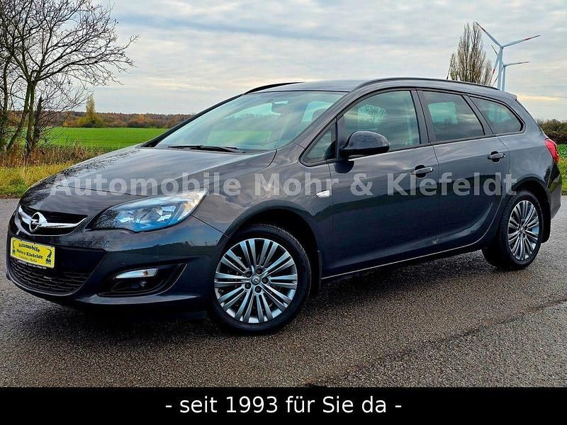 Grau Gebraucht 2014 Opel Astra Edition Kombi | 8.999 € (Teuer) - Bild 1/4