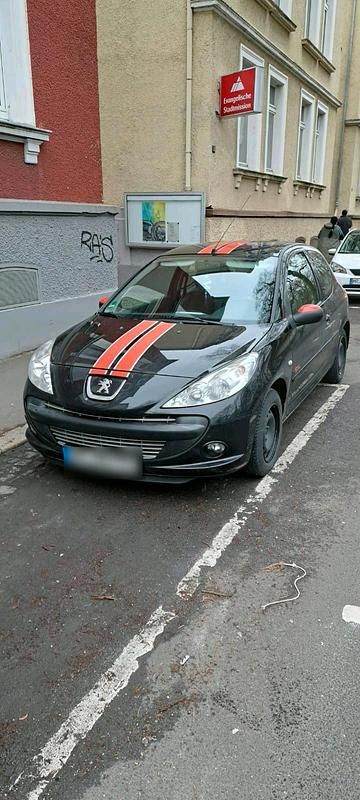 Gebraucht Peugeot 206 74 PS (54 kW) 2011 Schwarz Kleinwagen