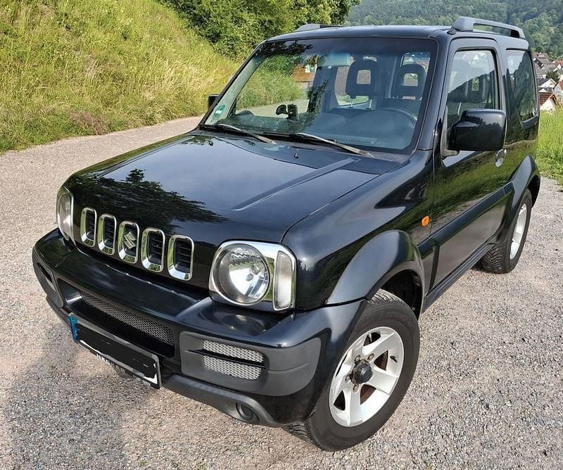 Schwarz Gebraucht 2010 Suzuki Jimny Comfort SUV | 8.700 € (Fairer Preis) - Bild 1/4