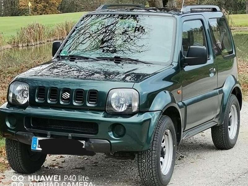 Grün Gebraucht 2001 Suzuki Jimny SUV | 6.850 € (Etwas zu teuer) - Bild 1/4