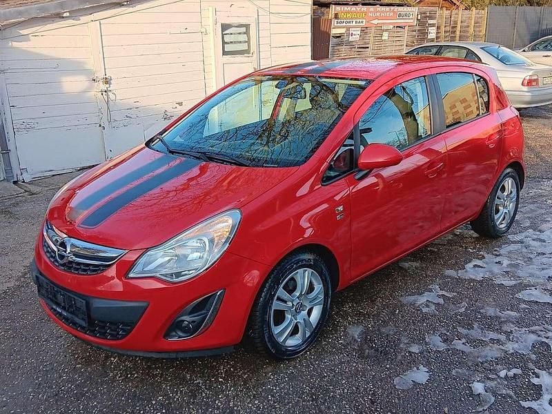 Magma rot (b) Gebraucht 2013 Opel Corsa Kleinwagen | 4.800 € (Fairer Preis) - Bild 1/4