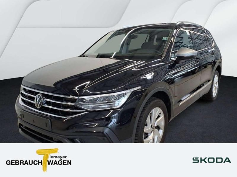 Schwarz Gebraucht 2024 VW Tiguan Allspace Life SUV | 34.790 € (Superpreis) - Bild 1/3
