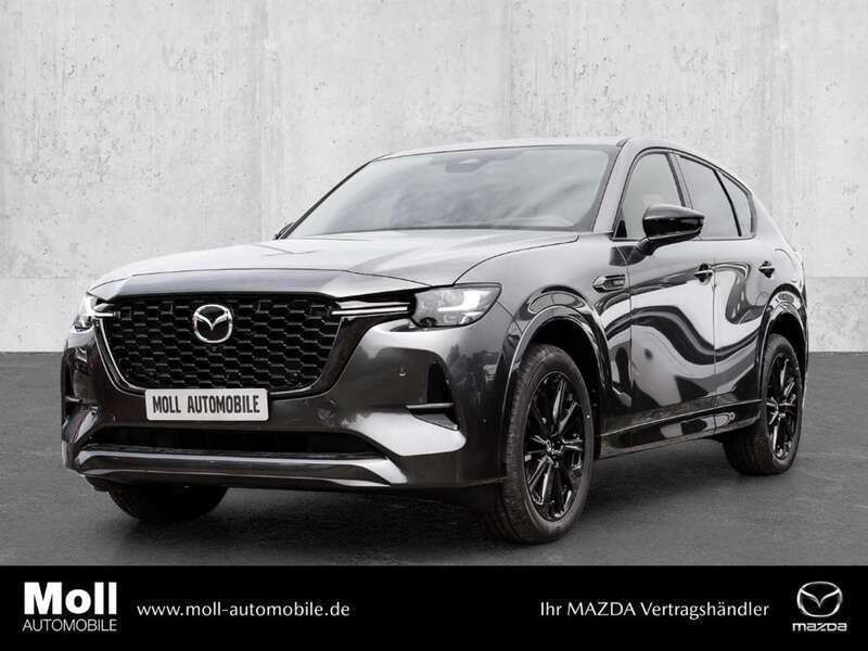 Machine grey metallic Neu 2025 Mazda CX-60 Homura-Line SUV | 60.980 € - Bild 1/4