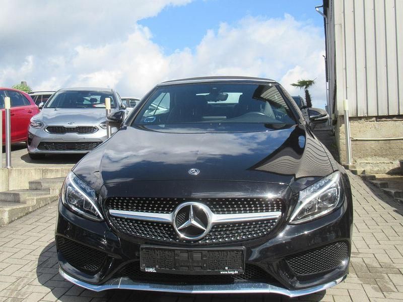 Schwarz Gebraucht 2019 Mercedes C180 AMG Cabrio | 24.890 € (Superpreis) - Bild 1/4