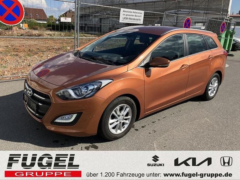Orange caramel metallic Gebraucht 2015 Hyundai i30 Kombi | 8.995 € (Guter Preis) - Bild 1/4