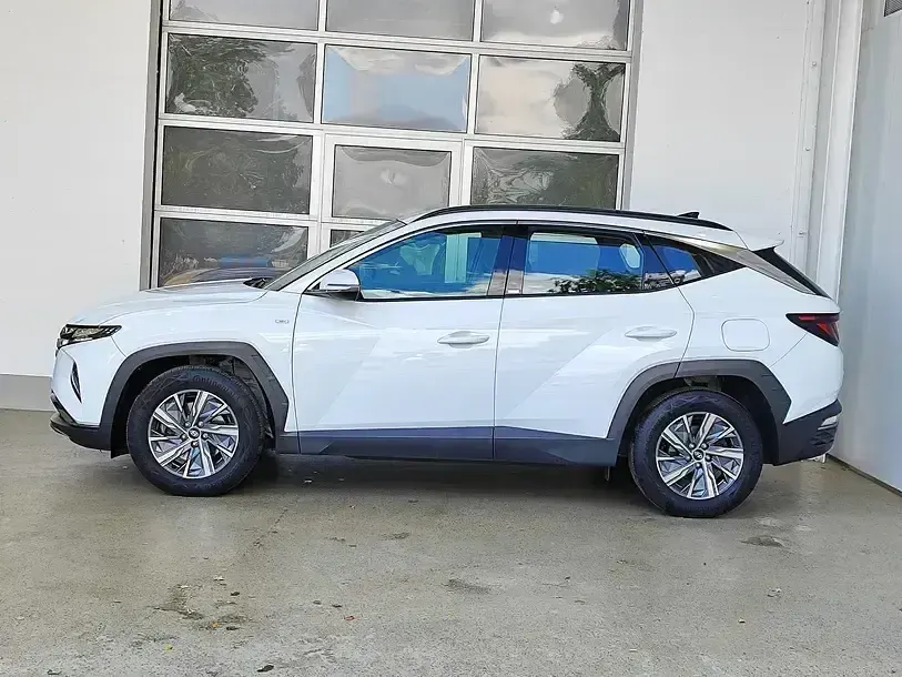 Gebraucht Hyundai Tucson Select 136 PS (100 kW) 2021 Polar white / sol SUV