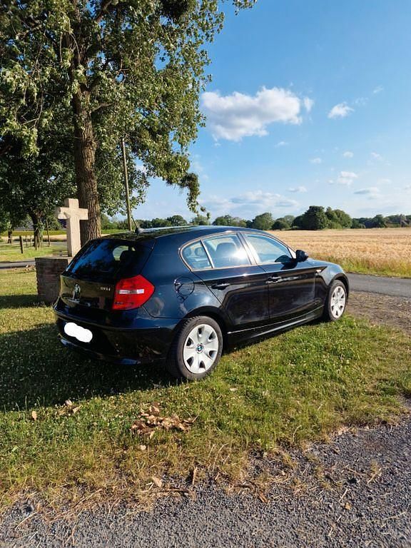 Gebraucht BMW 116 122 PS (89 kW) 2010 Schwarz Kleinwagen