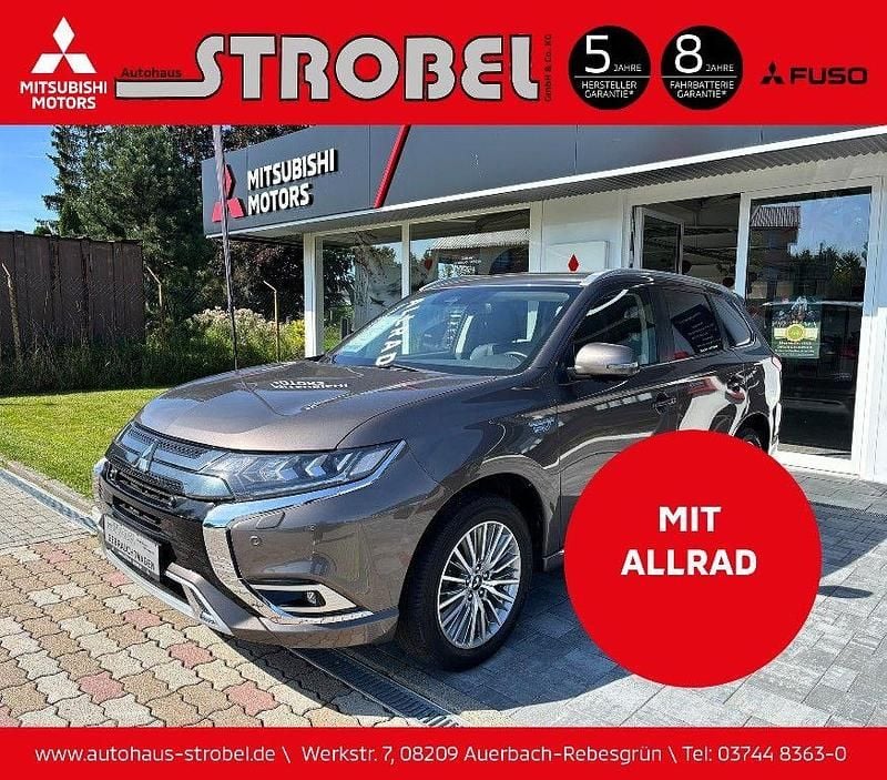 Granitbraun Gebraucht 2020 Mitsubishi Outlander P-HEV Plus SUV | 25.790 € (Fairer Preis) - Bild 1/4