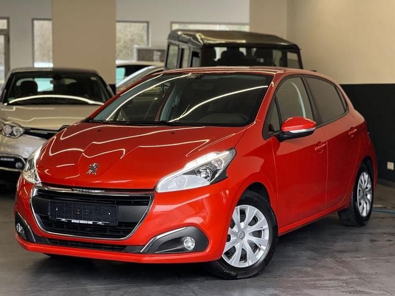 Gebraucht Peugeot 208 Active 82 PS (60 kW) 2018 Orange Kleinwagen