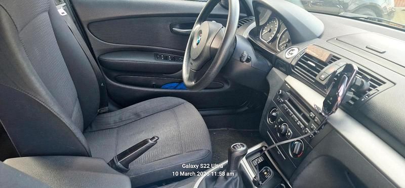 Gebraucht BMW 116 116 PS (85 kW) 2009 Schwarz Kleinwagen