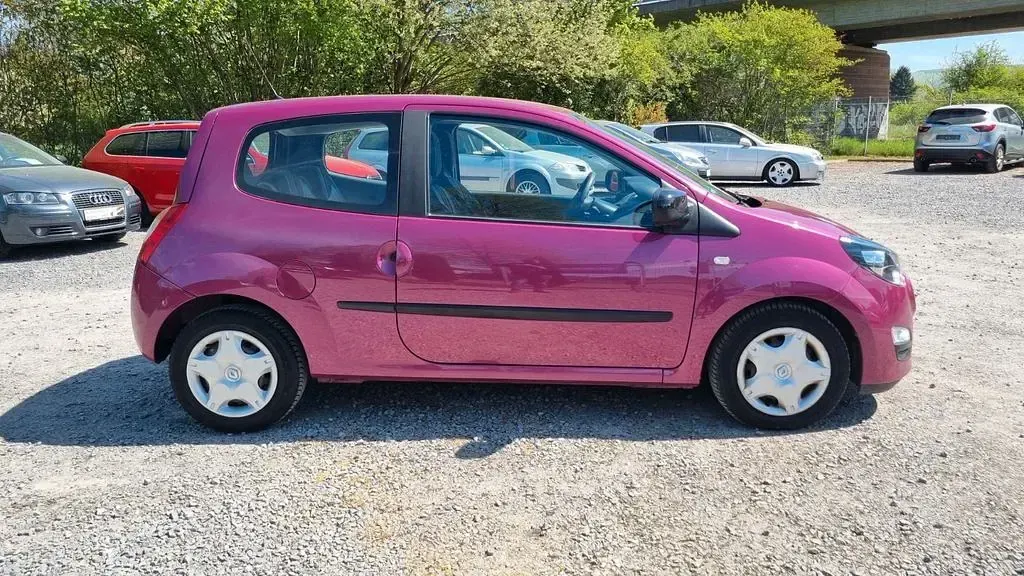 Używany Renault Twingo Expression 75 KM (55 kW) 2014 Purpurowy Hatchback