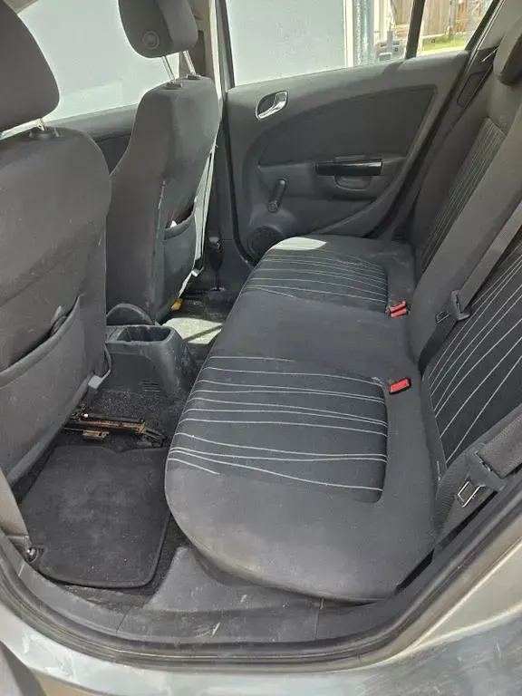 Używany Opel Corsa 75 KM (55 kW) 2010 Szary Hatchback