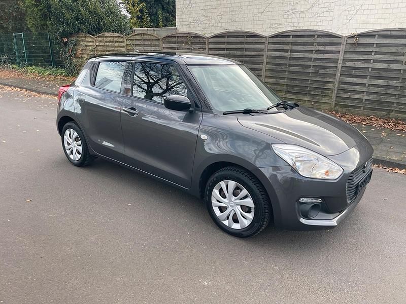 Grau Gebraucht 2018 Suzuki Swift Kleinwagen | 9.990 € (Fairer Preis) - Bild 1/4